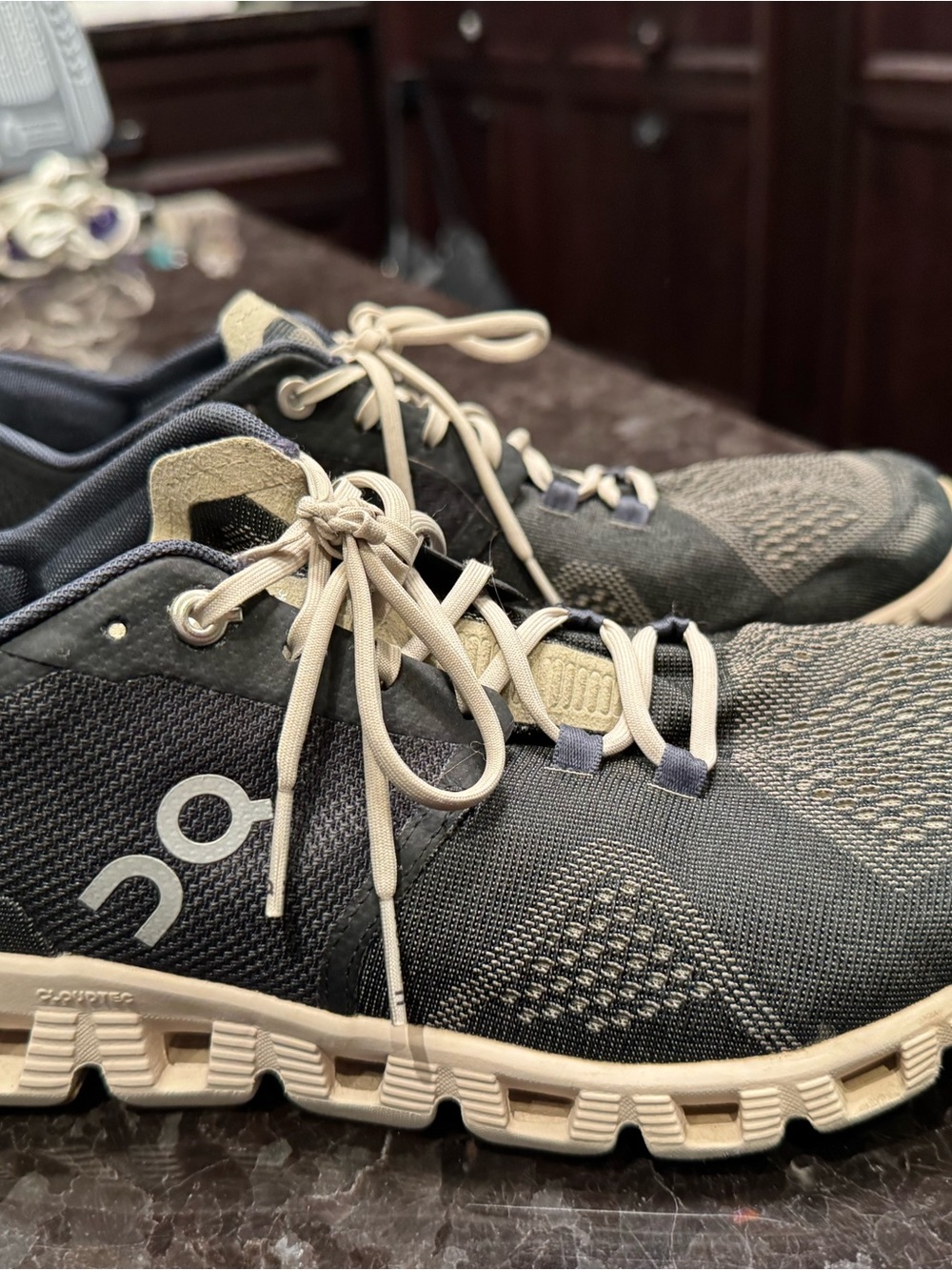 On Running women’s  Athletic Sneakers in Black and Tan